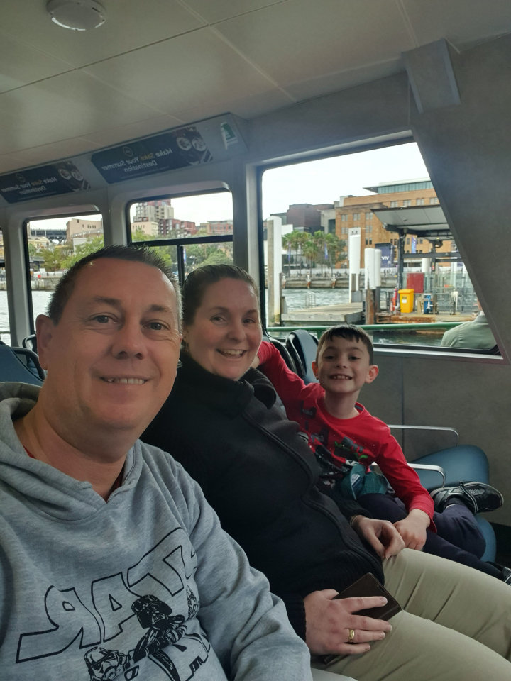 Family travelling to Taronga Zoo on the ferry